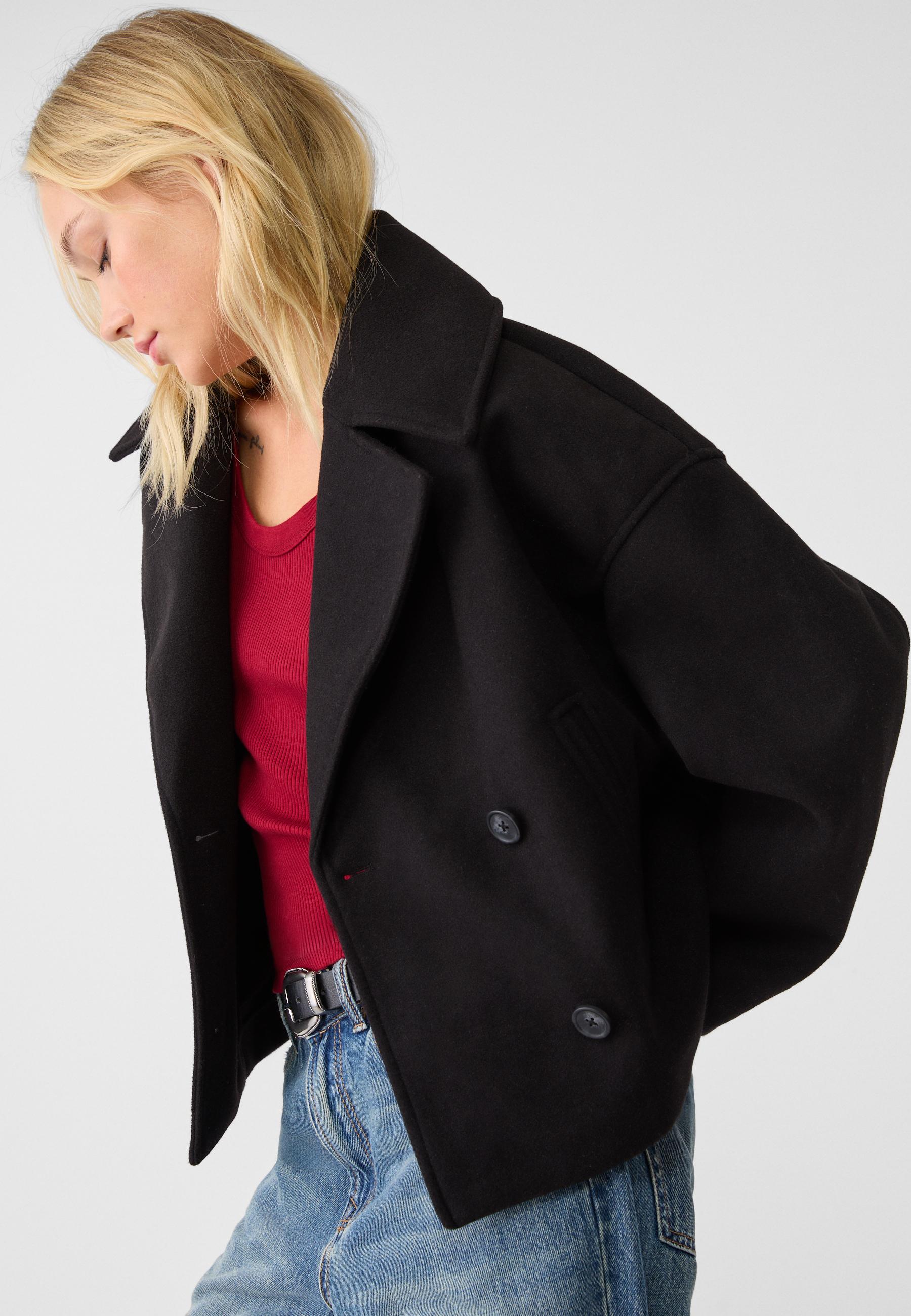 Boxy cropped double-breasted blazer in black, notched lapels and button front