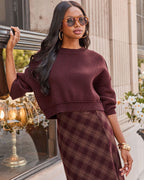 Cropped crewneck knit sweater in burgundy with ribbed hem and cuffs