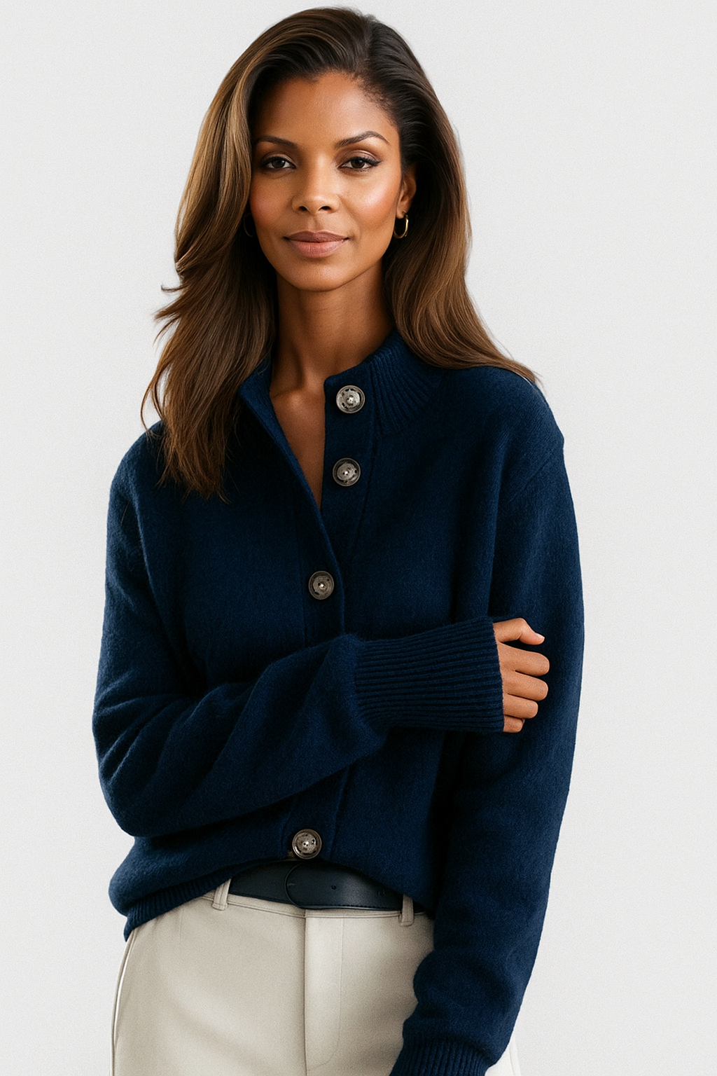 Dark blue knit cardigan with collar, button-front placket, long sleeves, ribbed cuffs