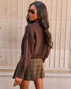 Dark brown cropped crewneck knit sweater with ribbed hem and cuff details