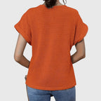 Orange crochet blouse back view with short flutter sleeves