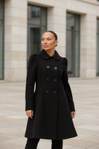 Black double-breasted skater coat with Peter Pan collar and decorative buttons