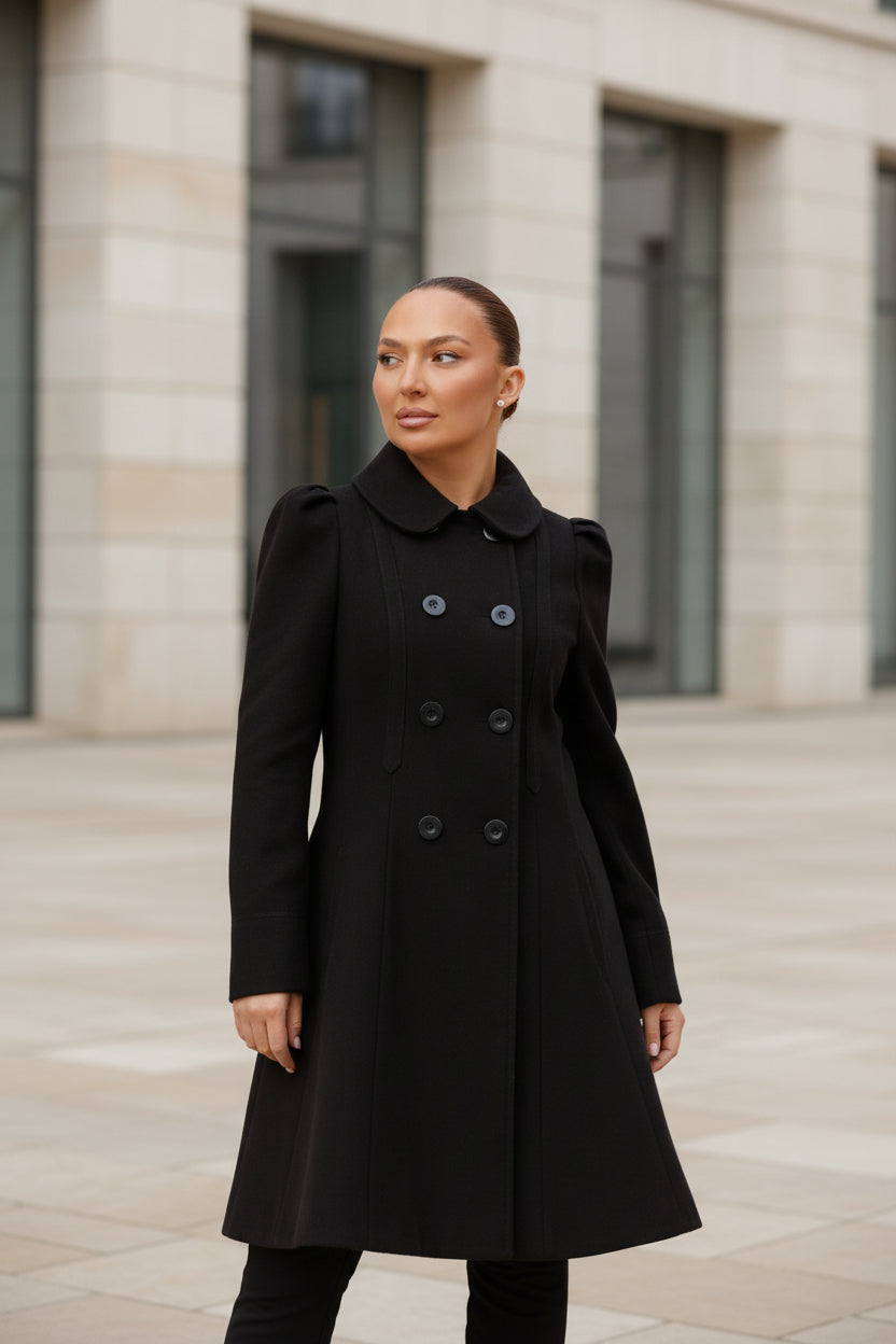 Black double-breasted skater coat with Peter Pan collar and decorative buttons