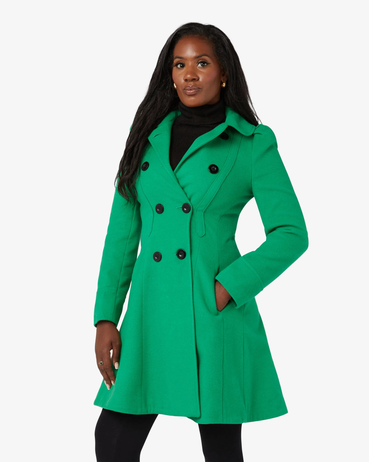 Green double-breasted skater coat with Peter Pan collar, side view.