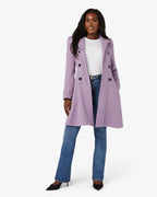 Lilac double-breasted skater coat with Peter Pan collar, front view on model.