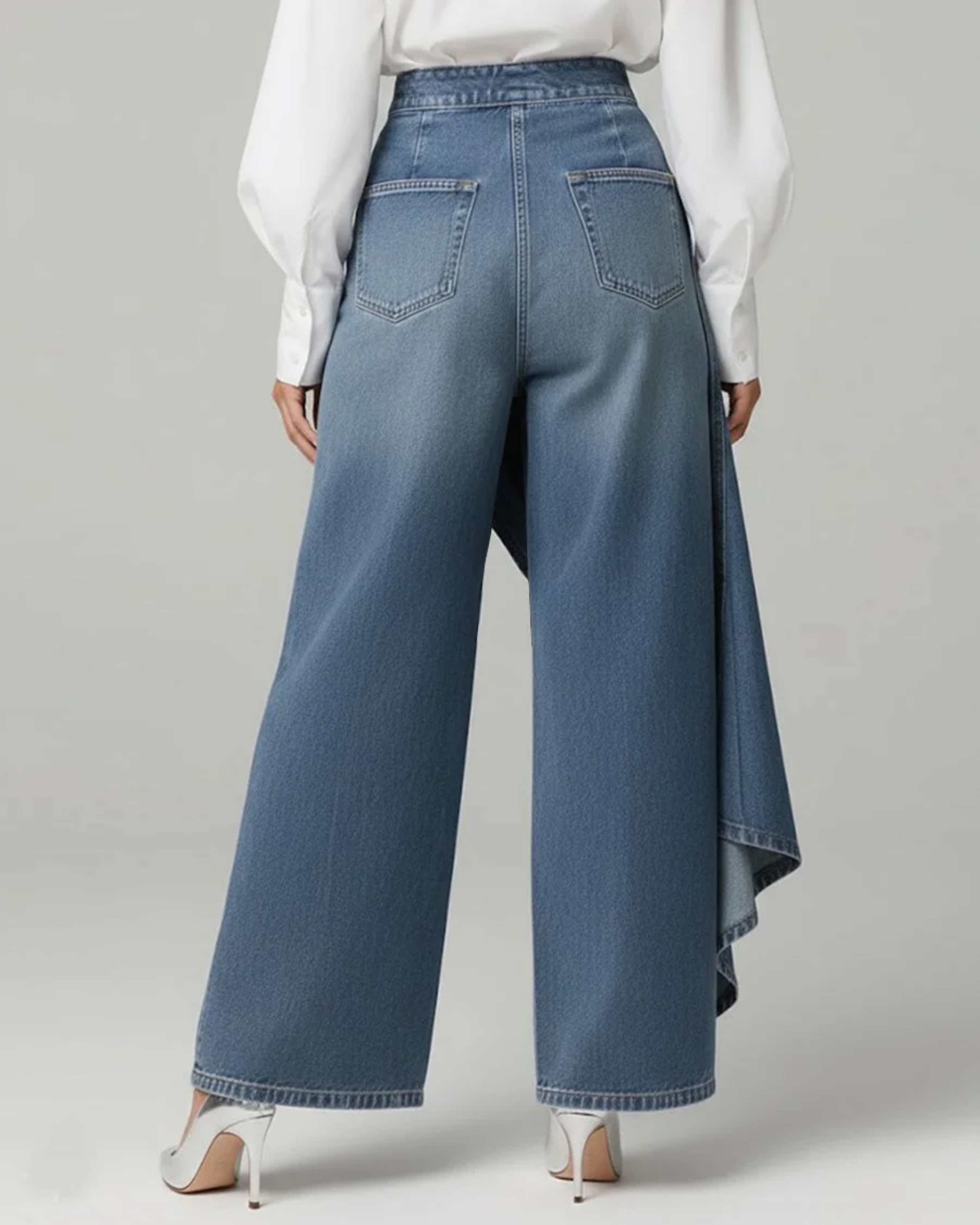 Light blue denim wrap trousers with high waist, button fly, asymmetric draped overlay
