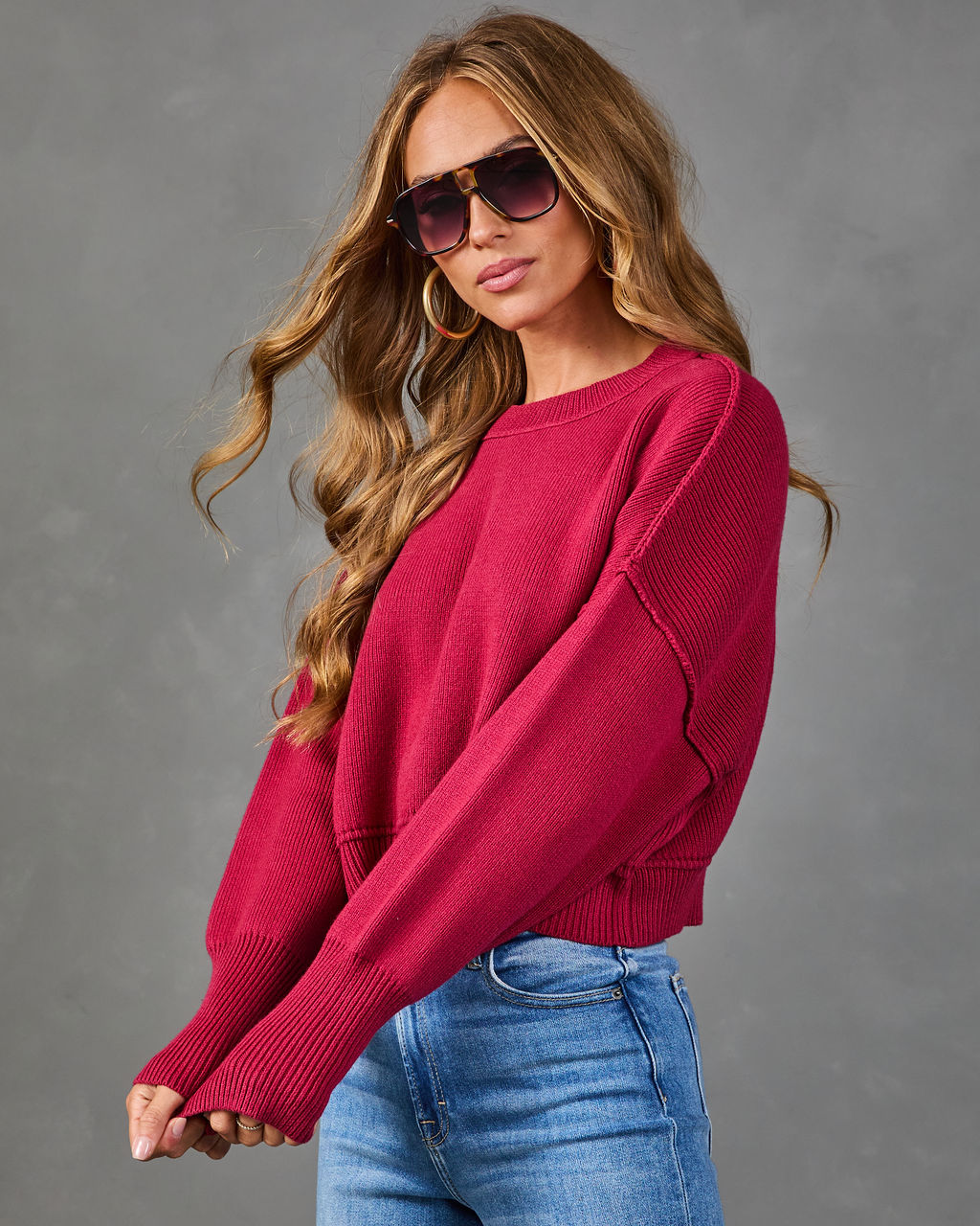Burgundy cropped crewneck sweater with textured knit and ribbed long sleeves