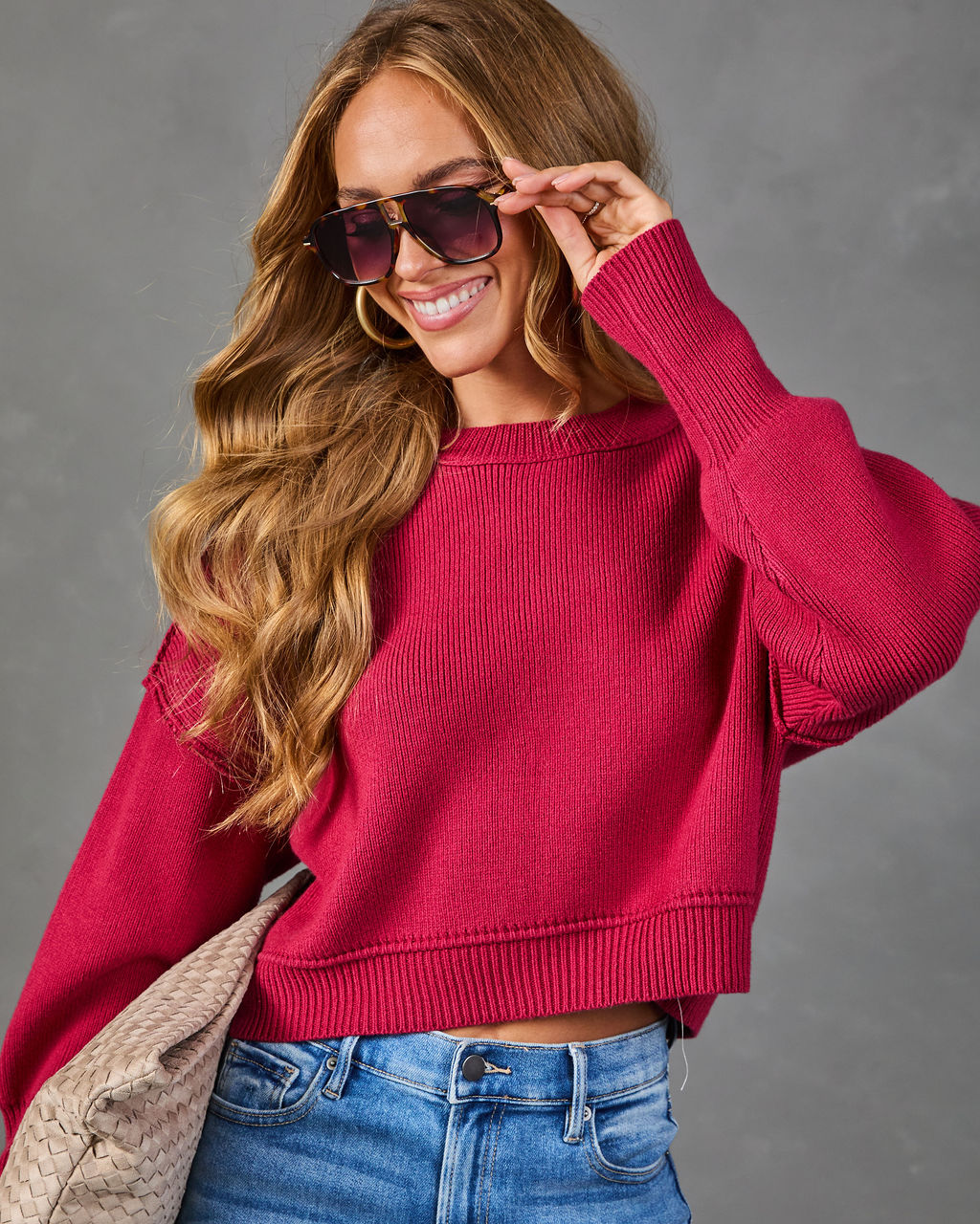 Burgundy cropped crewneck sweater with ribbed neckline, cuffs, and hem