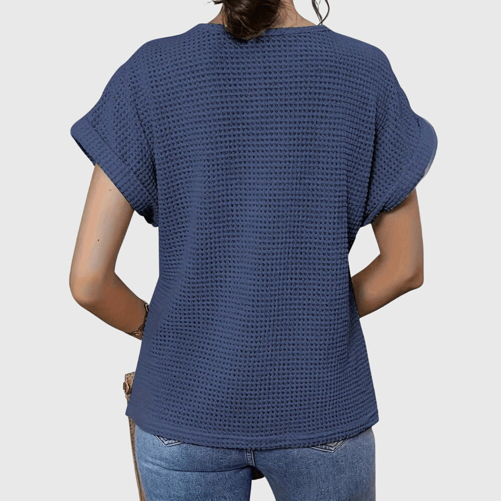 Navy crochet blouse back view with short flutter sleeves