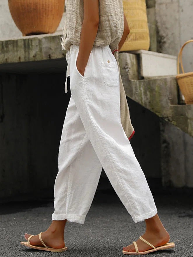 Women's white loose cotton drawstring pants with pockets, ankle-length