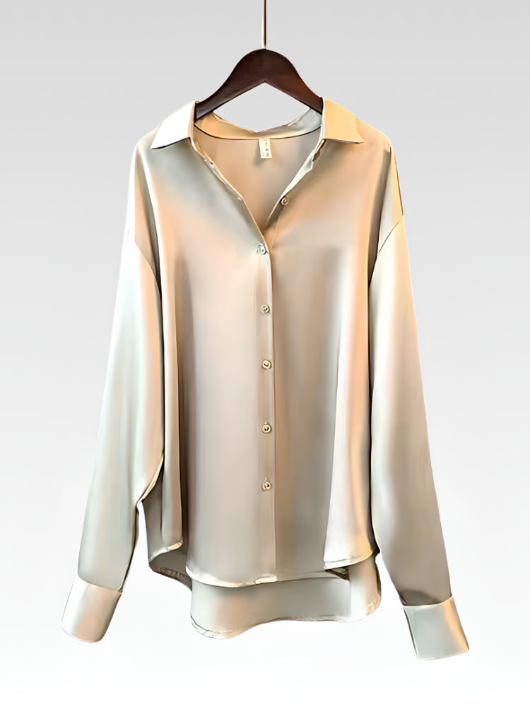 Champagne satin-style button-up shirt blouse on hanger with pointed collar and long sleeves