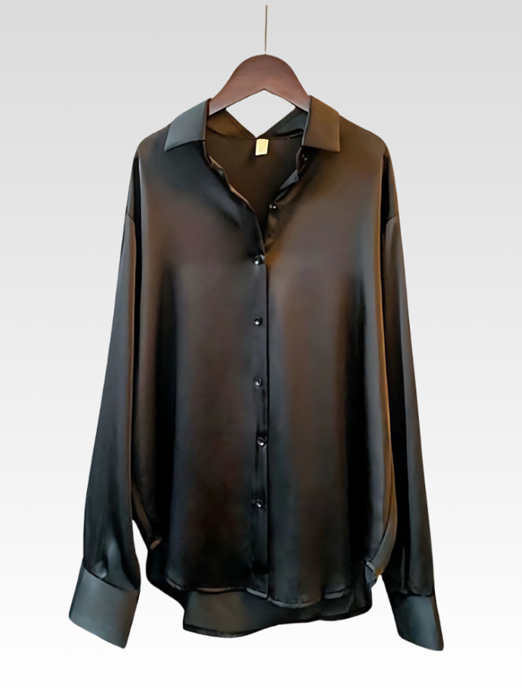Black satin-style button-up shirt blouse on hanger with pointed collar and long sleeves