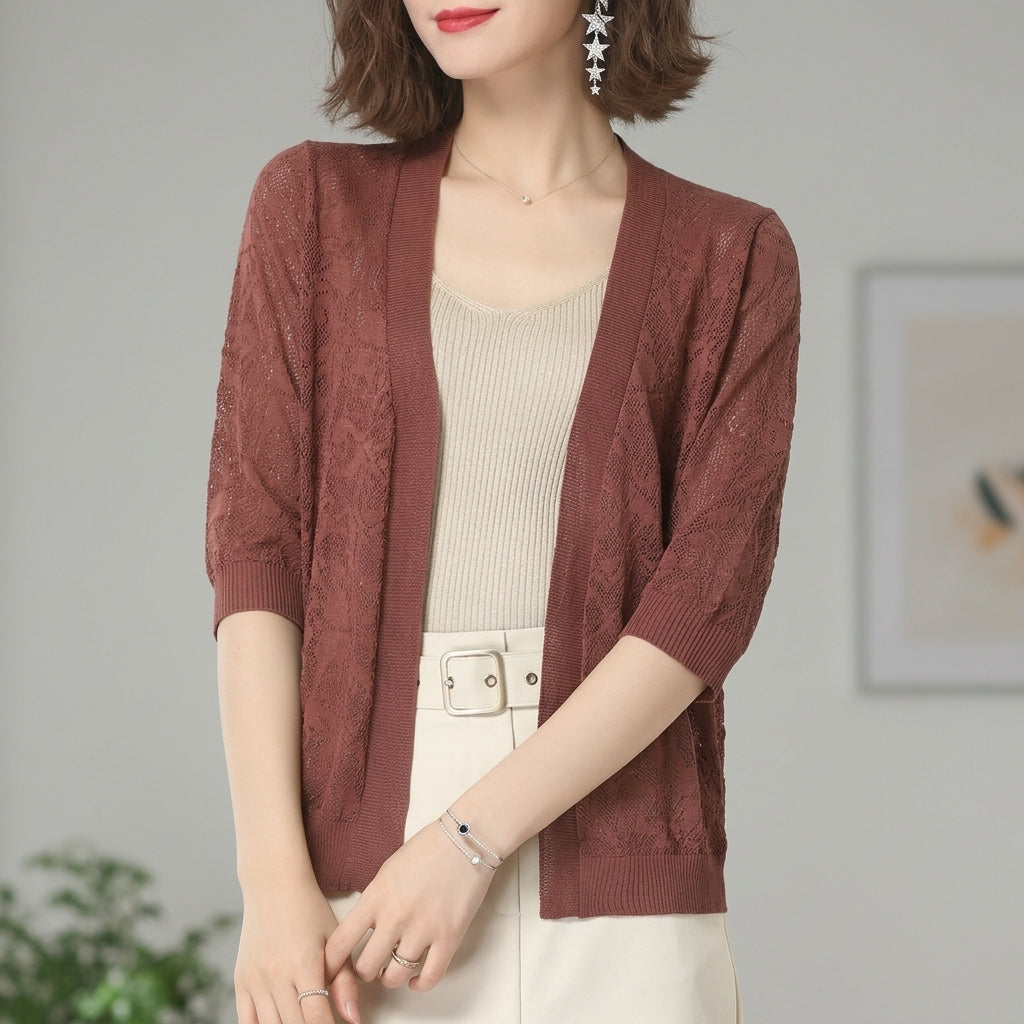Cropped lace knit cardigan with half sleeves and openwork lace detail in rust red