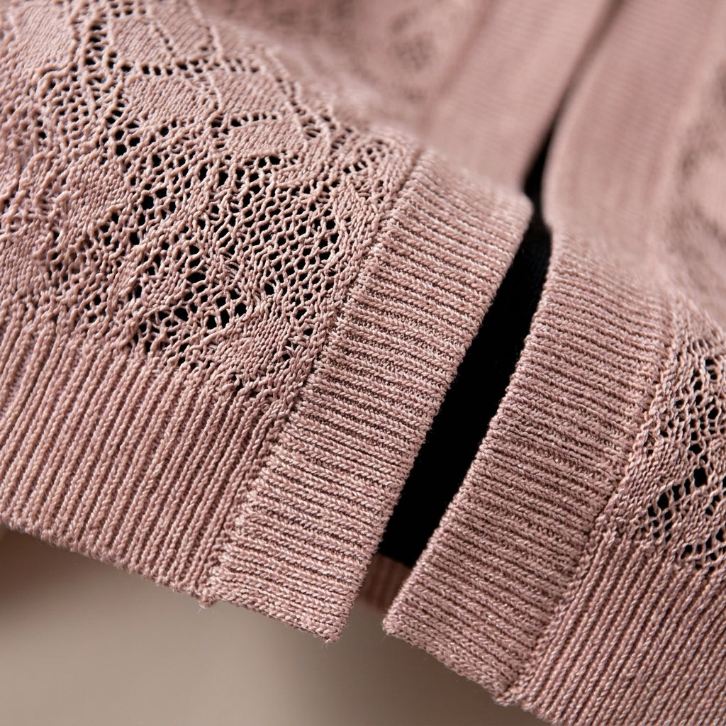 Cropped lace knit cardigan, half sleeves, ribbed trim and openwork pattern in light pink