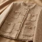 Brown cropped tweed jacket front with flap pockets, button placket, frayed hem