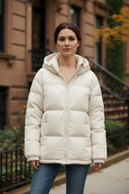 Cream hooded puffer jacket with full front zipper and quilted block panels