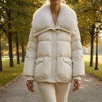 White puffer jacket with faux fur collar, zip front, and ribbed cuffs.
