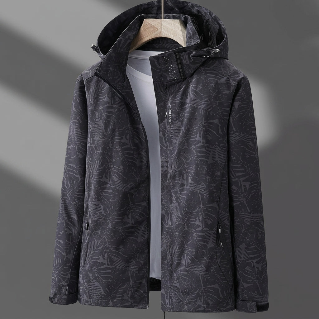 Black lightweight zip-up jacket with hood and all-over leaf print, front pockets