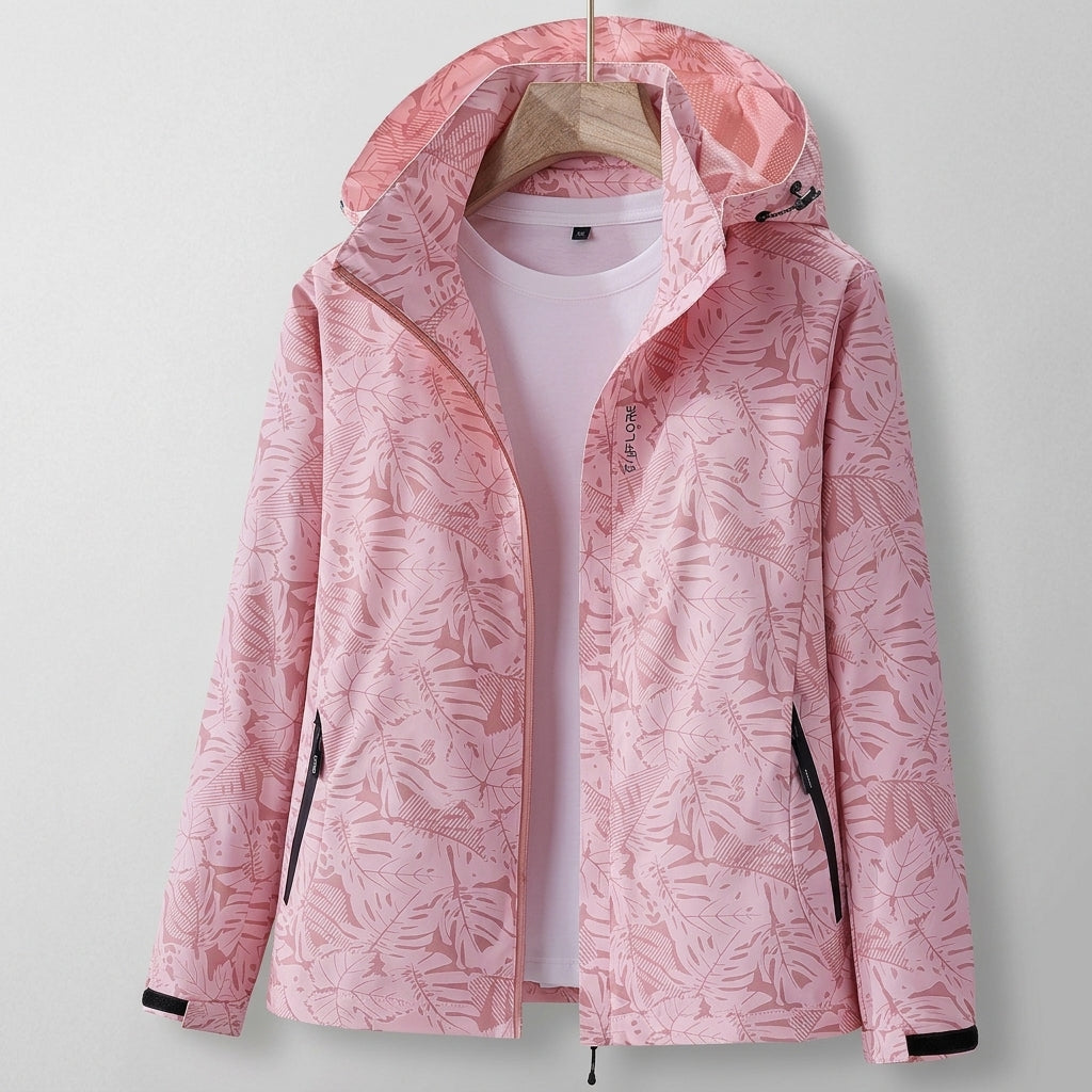 Pink lightweight zip-up jacket with hood and tropical leaf print, front zip and side pockets