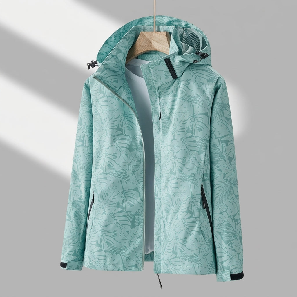 Teal lightweight zip-up jacket with hood, leaf print, adjustable hem and front pockets