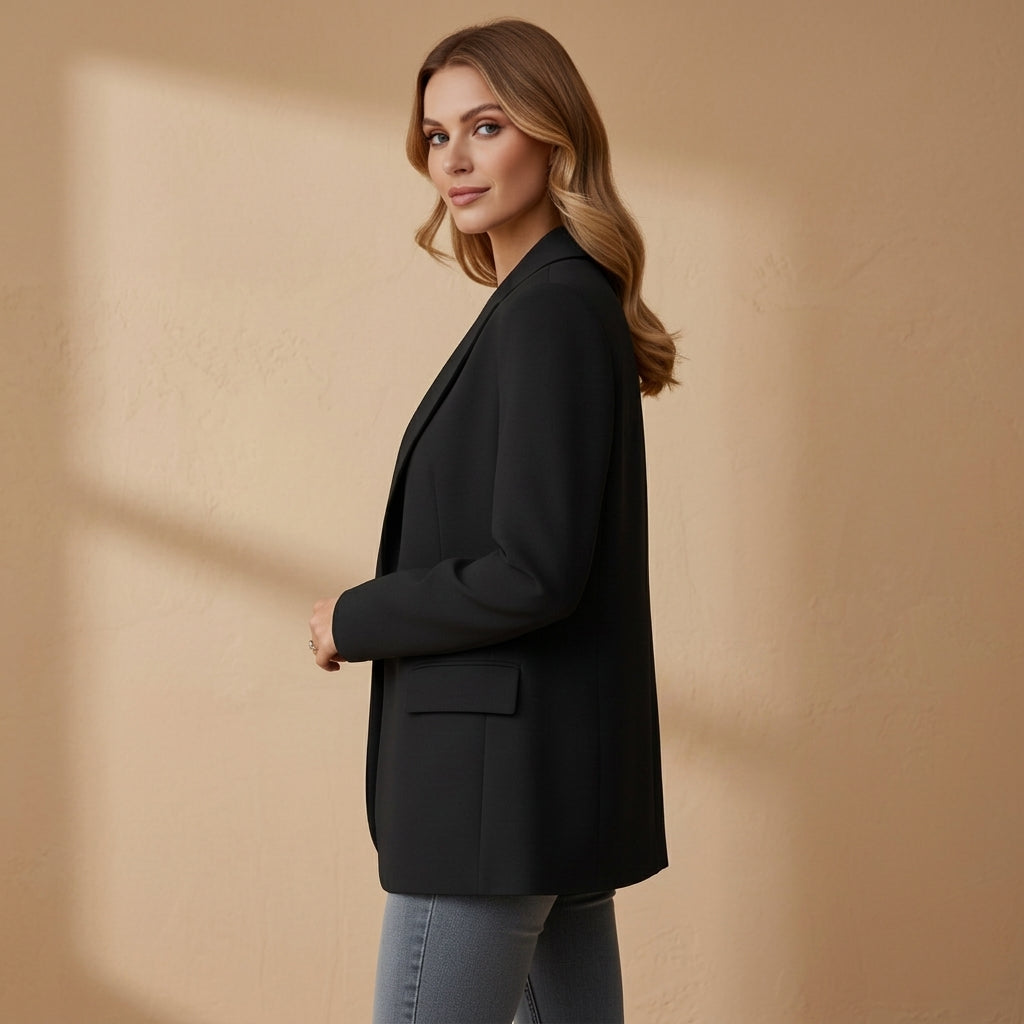 Women’s black blazer with notched lapel, single-breast front, long sleeves, flap pockets