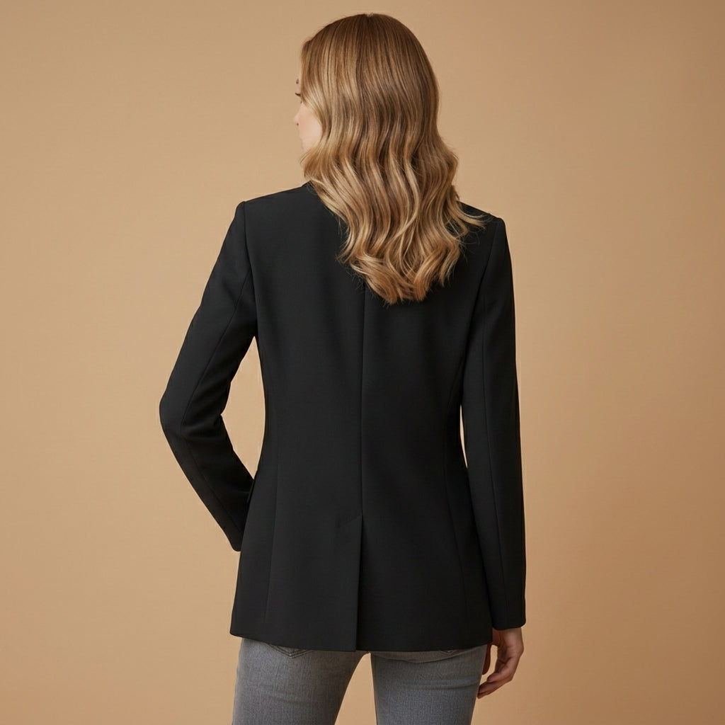 Women’s black tailored blazer, back view with long sleeves and structured seams