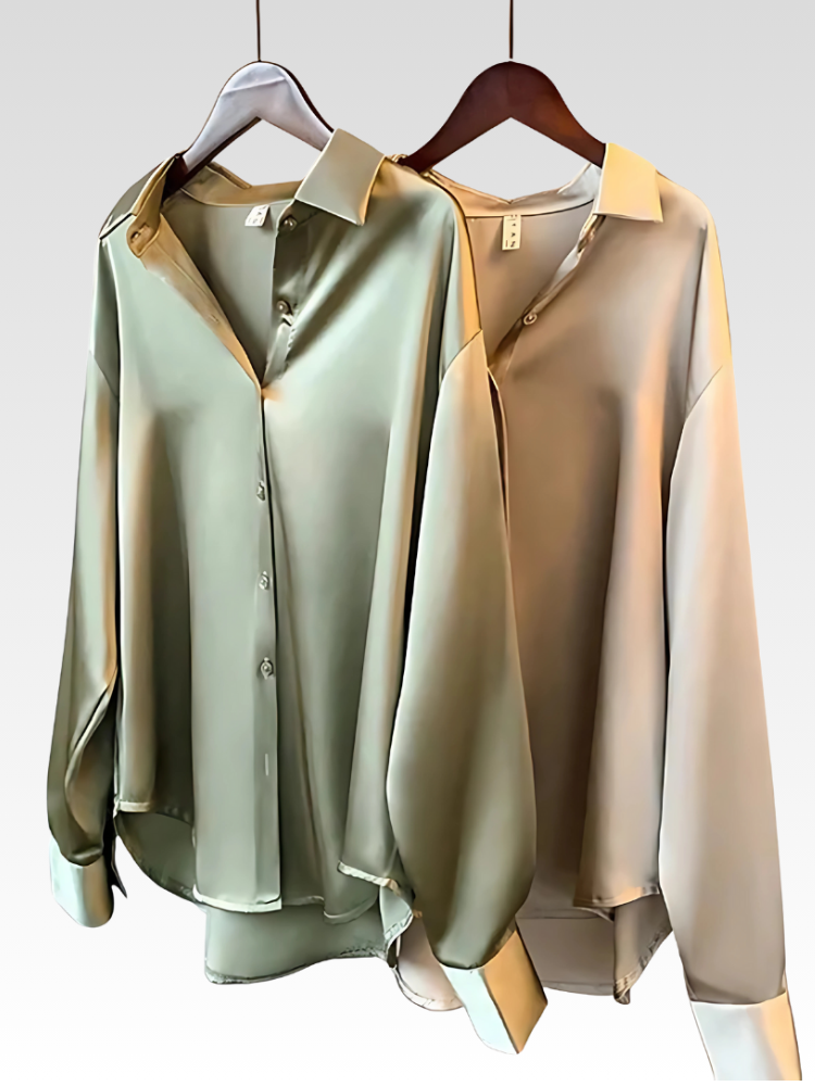 Satin-style button-up shirt blouses in olive green and champagne on hangers, pointed collars