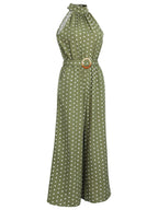 Green polka dot halter jumpsuit with belt buckle and wide-leg pants