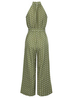 Green polka dot halter jumpsuit with belt and wide-leg silhouette