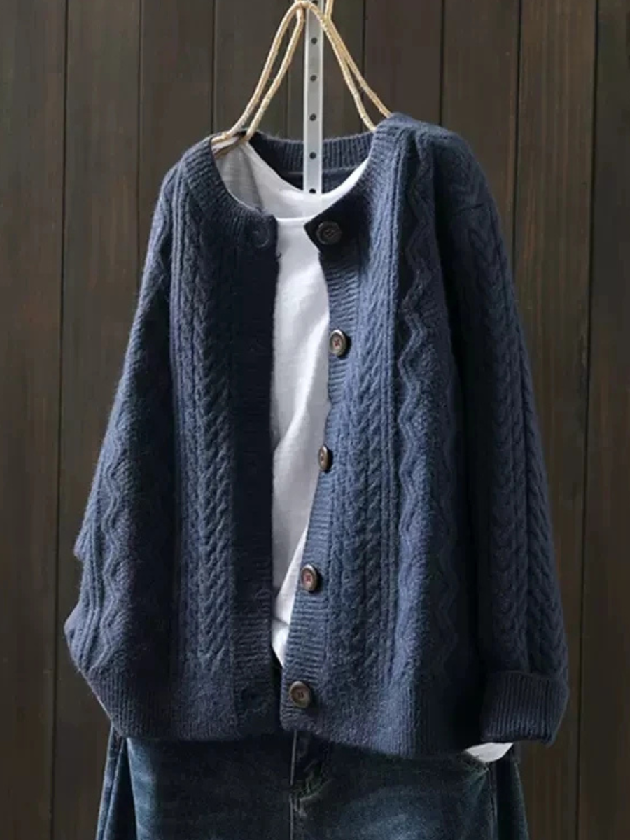 Navy blue cable-knit cardigan with button front and ribbed trim