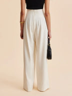 Cream wide-leg tailored pants, floor-length wide leg with gold-button closure