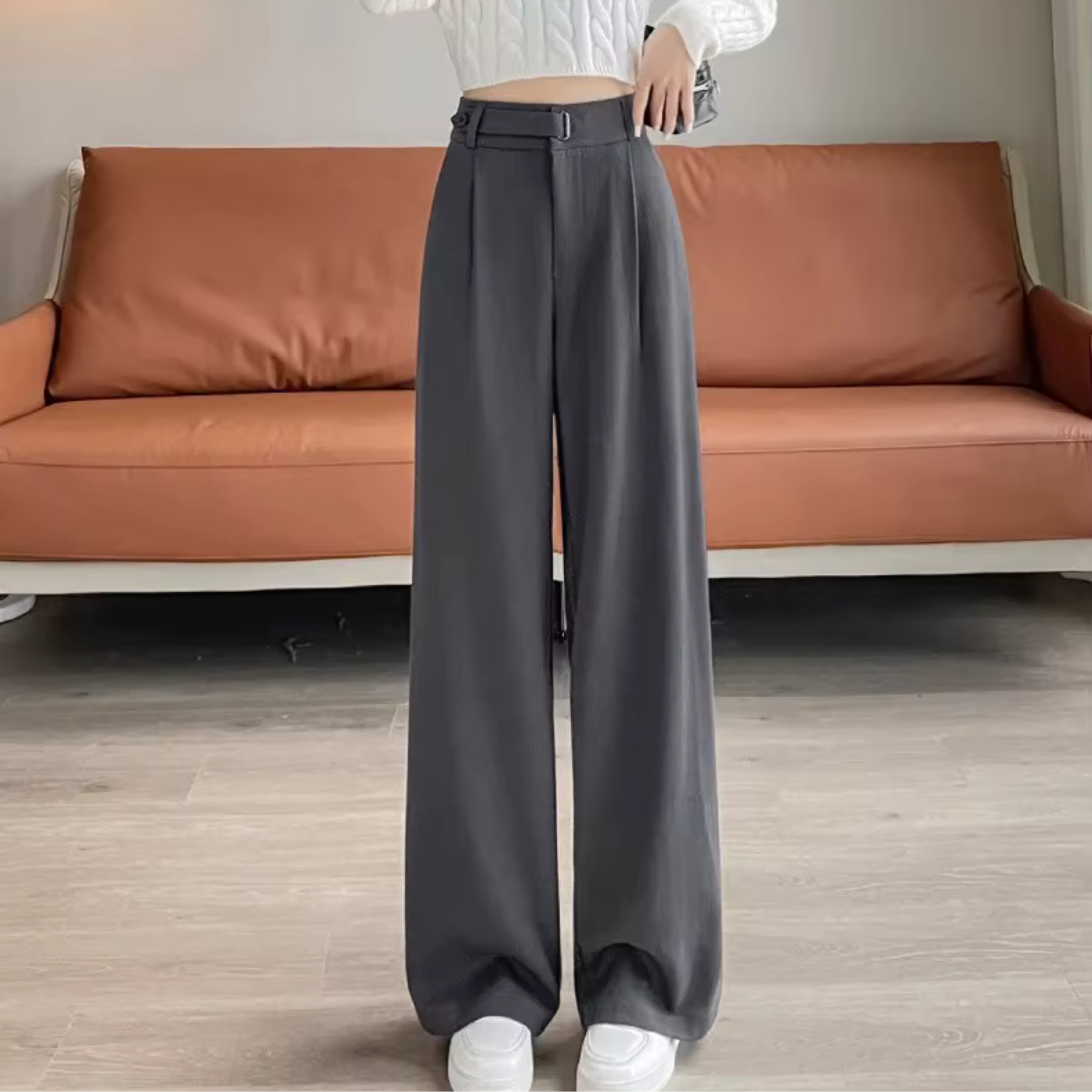 Women's high-rise wide-leg trousers, gray with belt loops and pleated front.