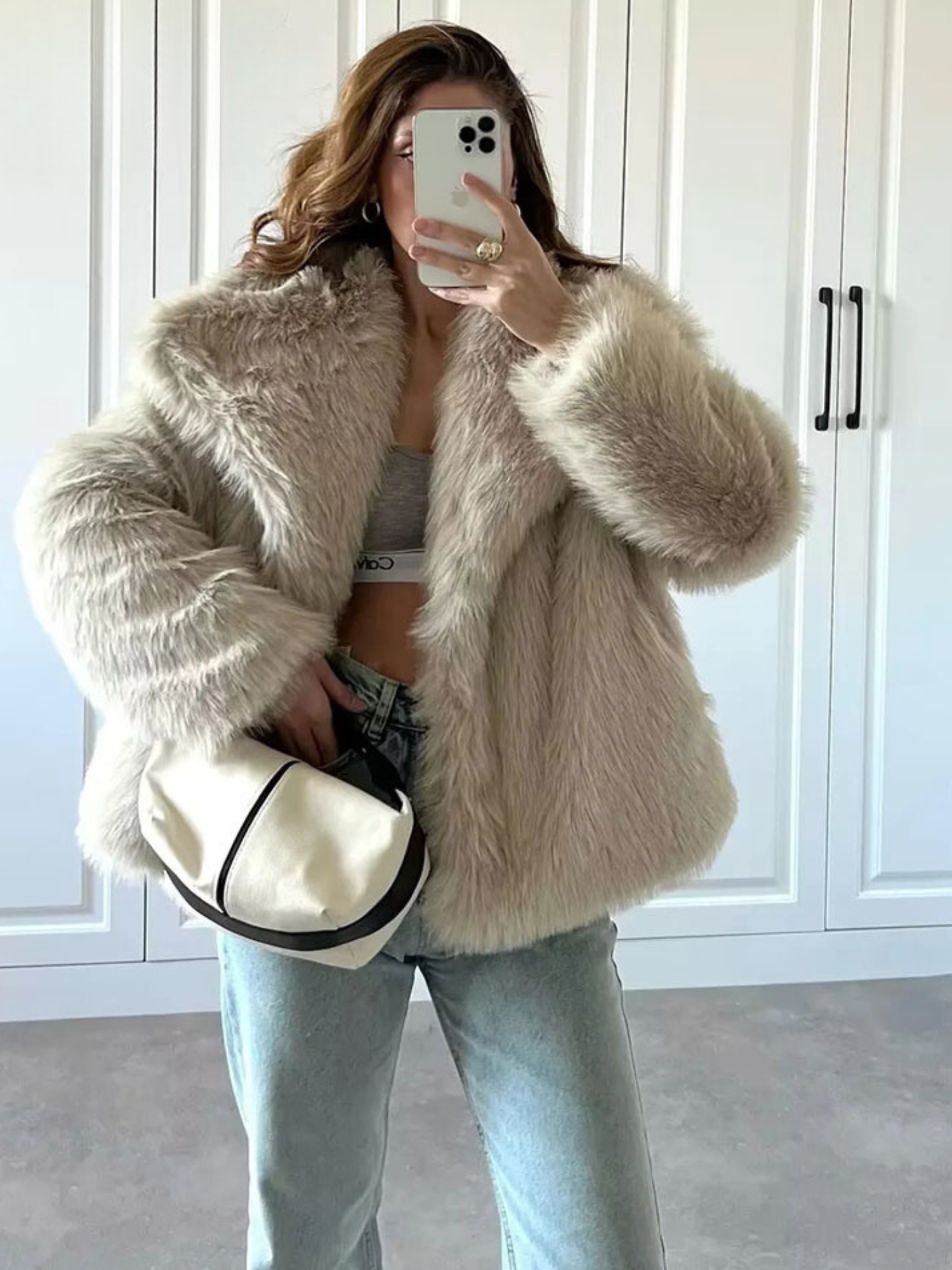 Oversized faux fur jacket in light beige with wide collar and button front