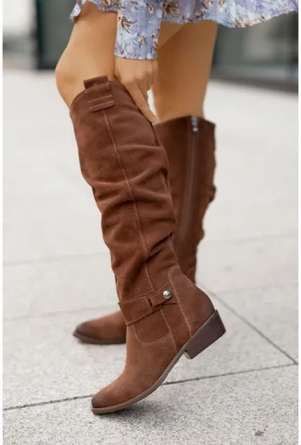 Women’s brown suede ankle boots with stacked heel and side buckle strap