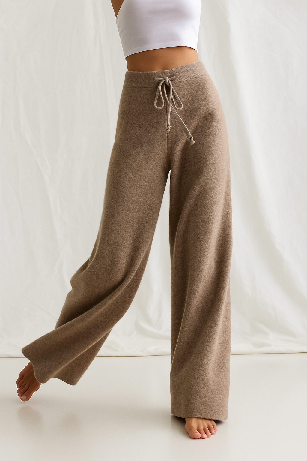 High-waisted wide-leg lounge pants in warm taupe, drawstring tie at the waist