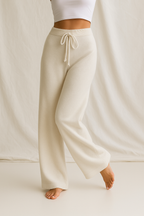 Women’s high-waisted wide-leg lounge pants with drawstring, light khaki/cream color