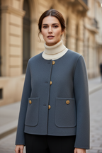 Gray button-front jacket with ribbed high collar and two patch pockets.