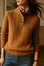 Tan cable-knit cashmere button-up sweater with three-button placket and ribbed hem.