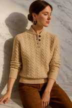 Cream button-up cable-knit cashmere sweater with three-button placket and ribbed hem
