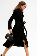 Black belted wool midi coat with wrap-style front and tie belt at waist
