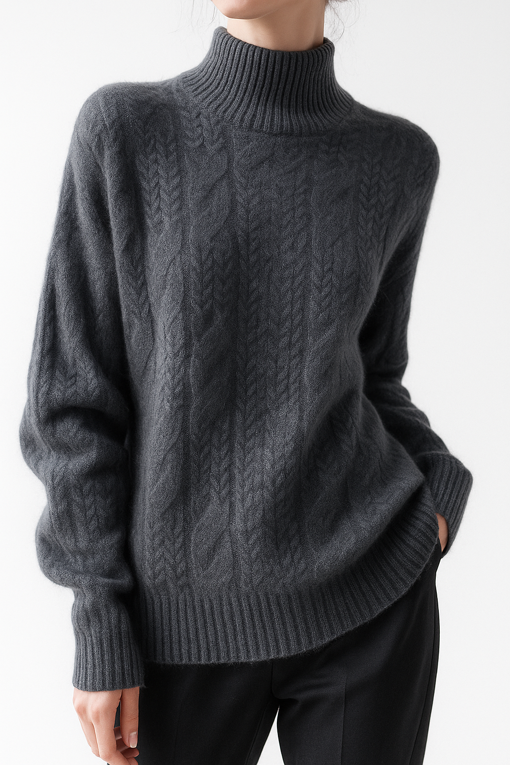 Dark gray cable knit mock neck sweater with long sleeves and ribbed cuffs