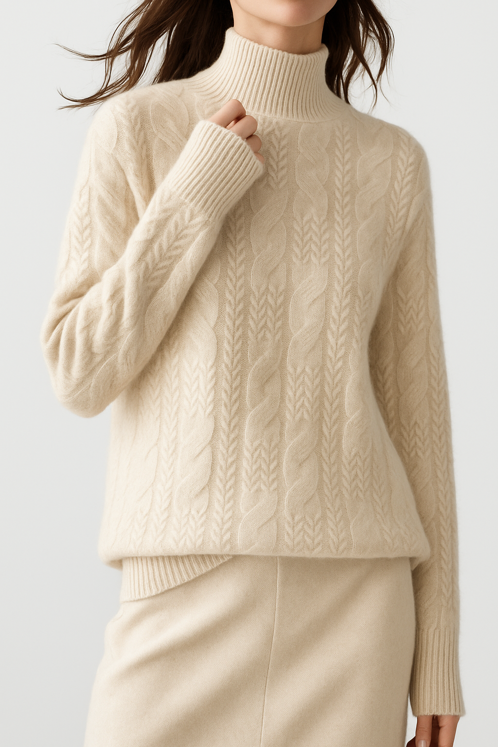Cream cable knit mock neck sweater with long sleeves and ribbed neckline