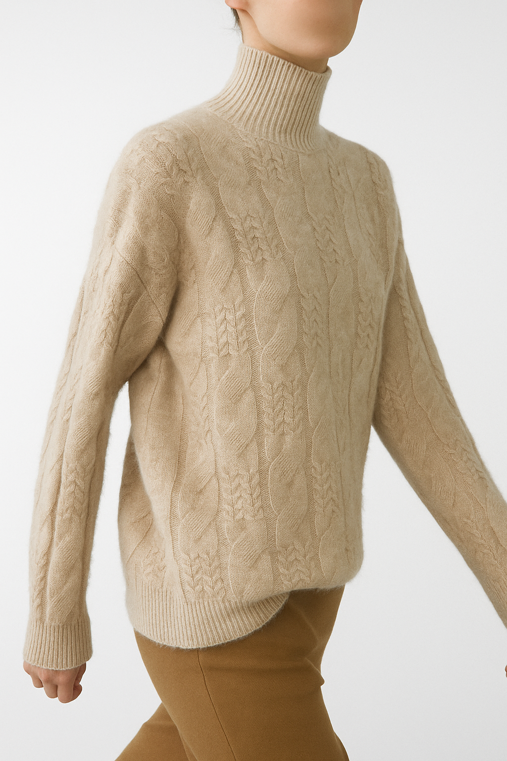 Beige cable knit mock neck sweater with long sleeves and ribbed neckline, cuffs, hem.