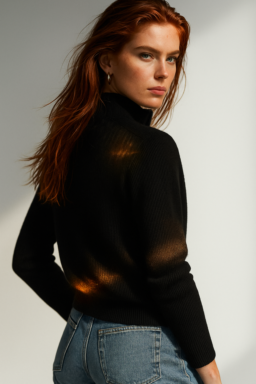 Black ribbed knit zip-up cardigan with long sleeves and stand collar