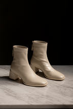 Ivory genuine leather square-toe ankle boots with block heel, side tie detailing