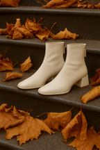 Ivory genuine leather square-toe ankle boots with block heel and side tie pulls
