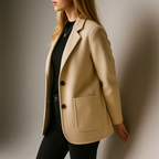Ivory wool blazer with notch lapels, two front buttons, and flap pocket; three-quarter view