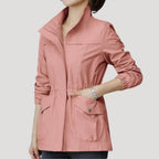 Light pink women’s zip-front windbreaker with flap chest pocket and side pockets