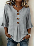 Gray striped V-neck blouse with three-button front and 3/4 ruffle sleeves
