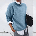 Blue crew neck knit sweater with long sleeves, relaxed fit